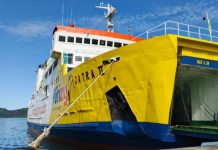 KMP Jatra II Layani Rute Sibolga-Nias: Solusi Transportasi Laut yang Vital bagi Kepulauan Nias Colorful ferry docked at the harbor - kmp jatra ii